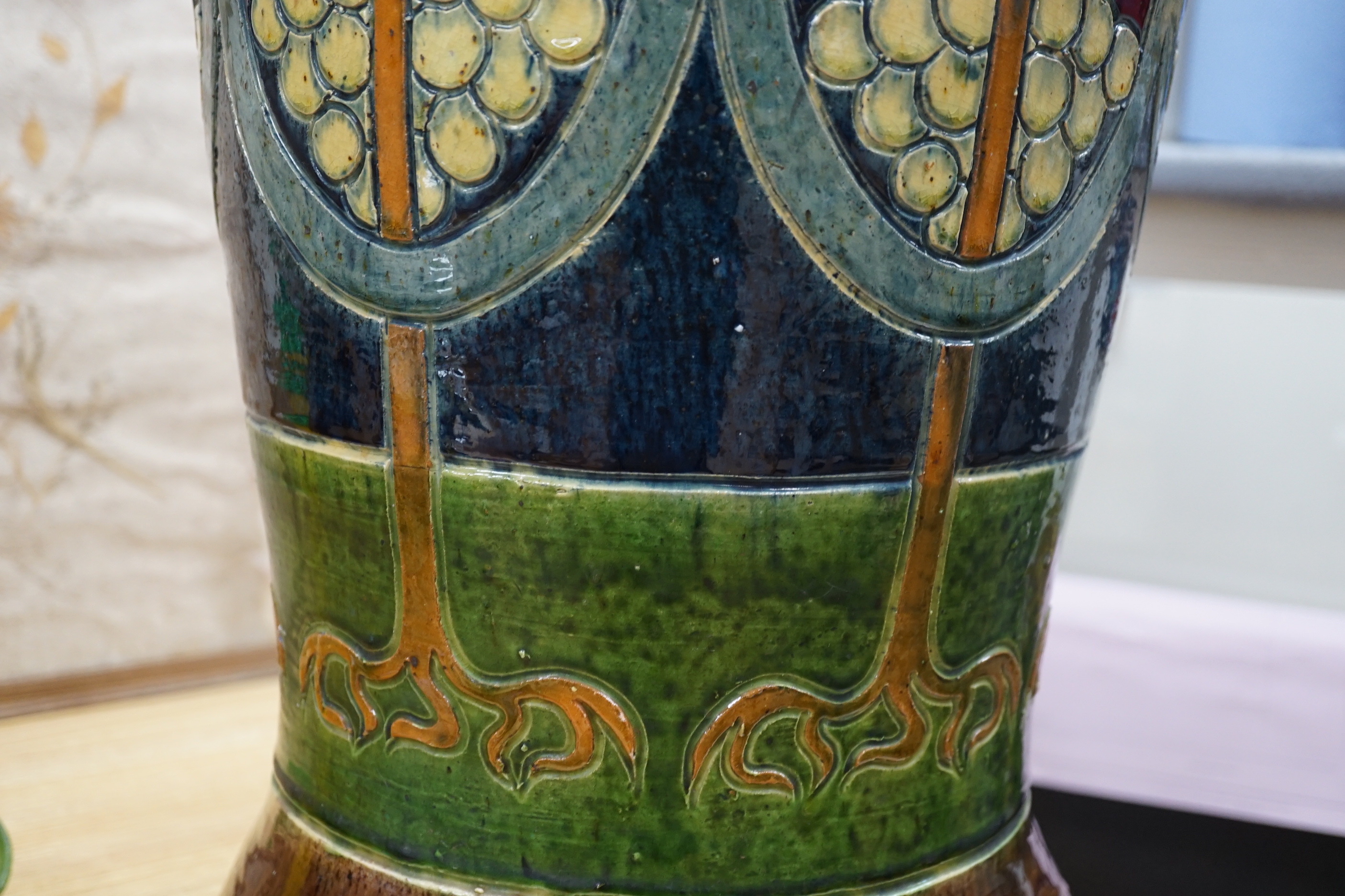 A Continental Art Nouveau pottery umbrella stand, 58cm